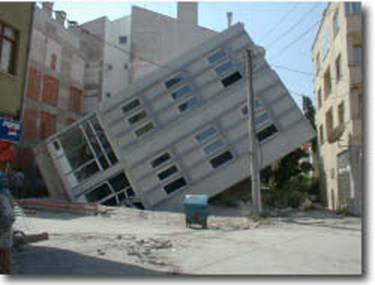 Photo Description: Building overturning because of the liquefaction